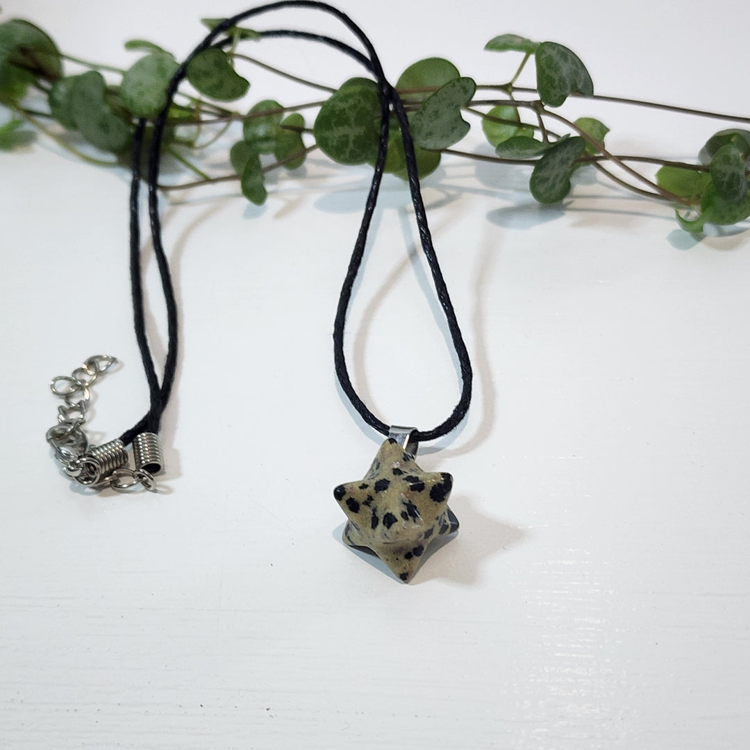 Dalmation Jasper Merkabah Pendant
Comes with a black cord necklace