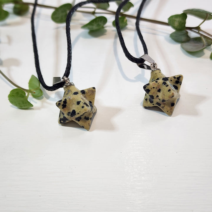 Dalmation Jasper Merkabah Pendant
Comes with a black cord necklace