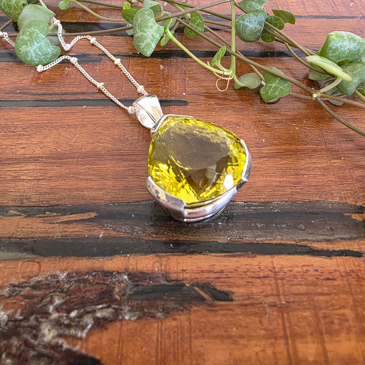 Lemon Quartz Pendant set in 925 sterling silver, comes with a sterling silver chain.