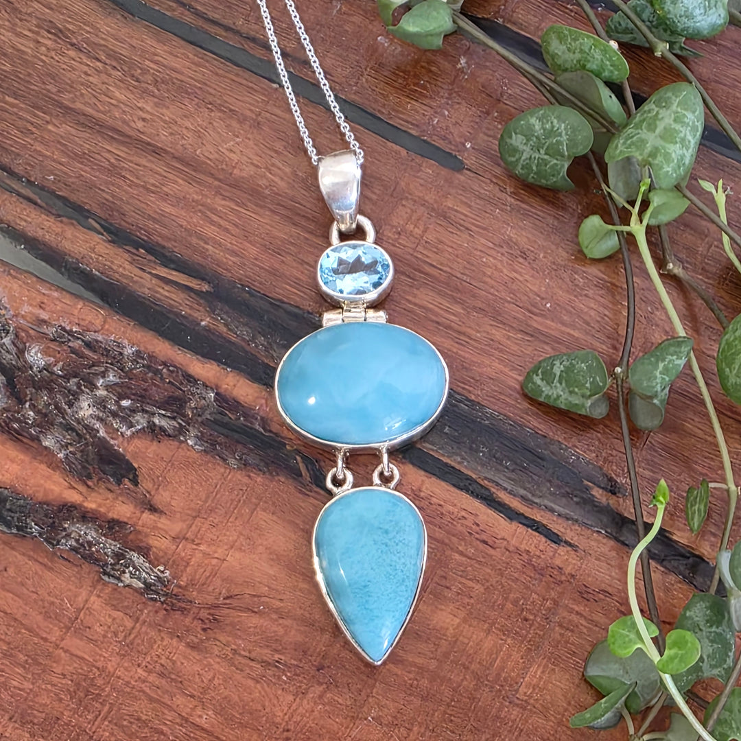 Larimar & Blue Topaz Pendant set in 925 Sterling Silver.
Comes with 40cm Sterling Silver Chain.