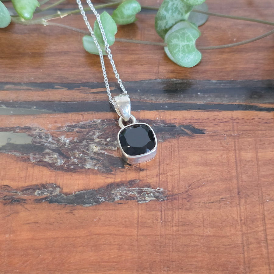 Back Onyx Pendant set in 925 sterling silver.