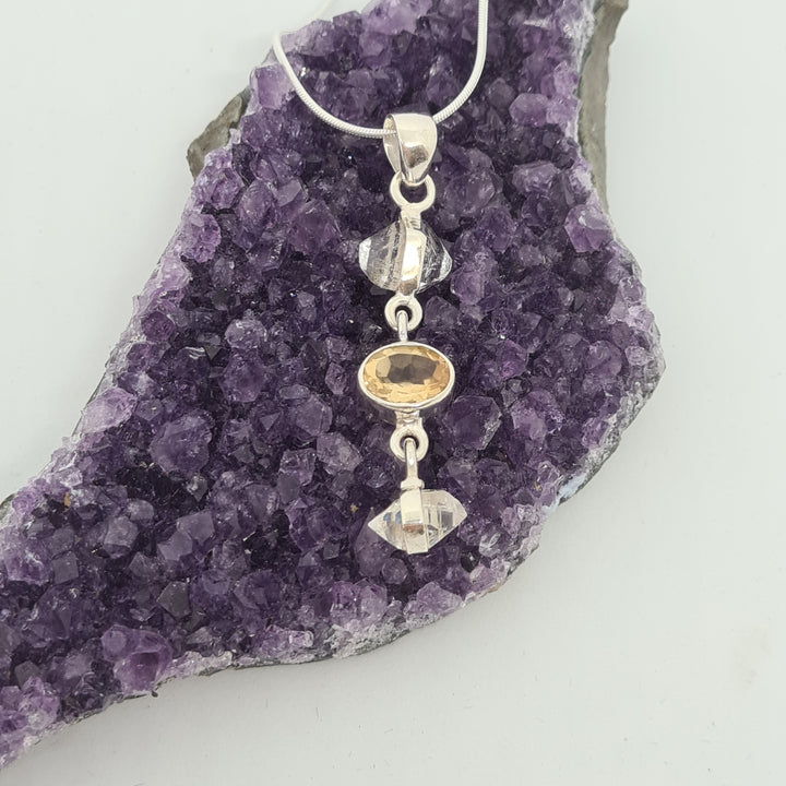 Citrine and Herkimer Diamond Pendant set in 925 sterling silver.