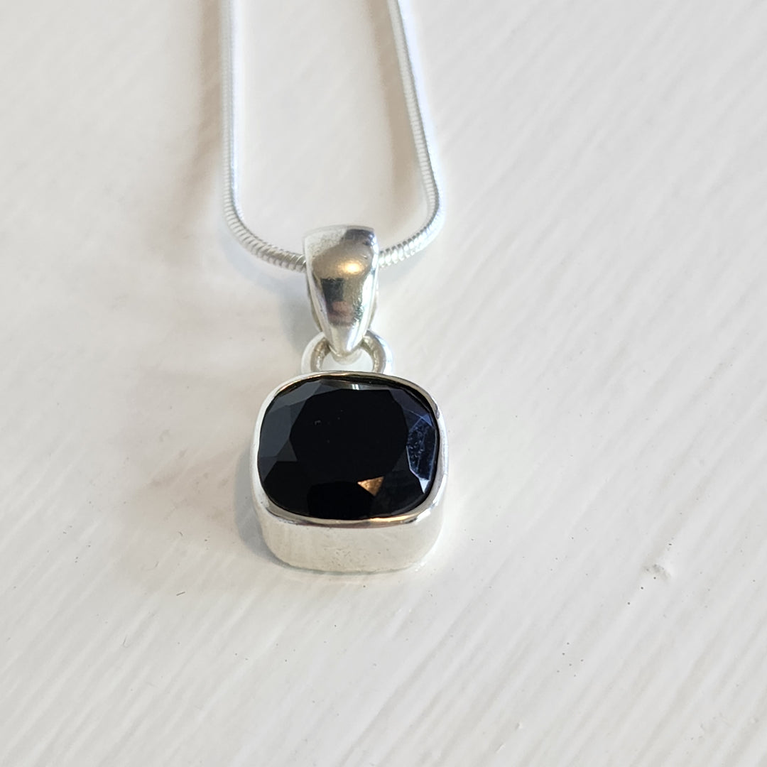 Back Onyx Pendant set in 925 sterling silver.