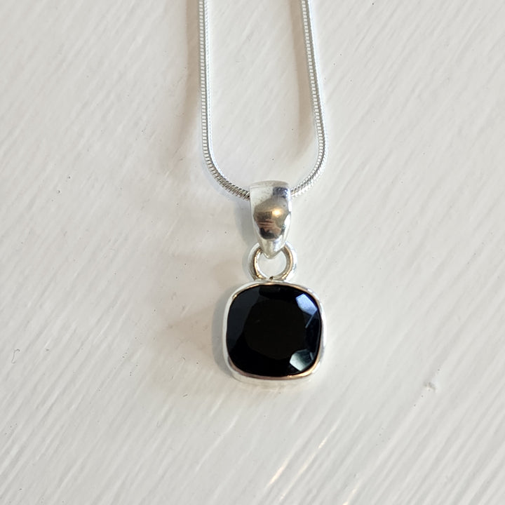 Back Onyx Pendant set in 925 sterling silver.