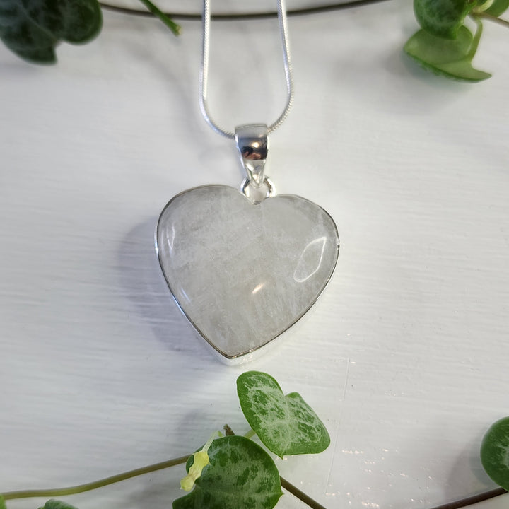 Rainbow Moonstone Heart Pendant.
Set in 925 Sterling Silver and comes with a 925 sterling silver chain.