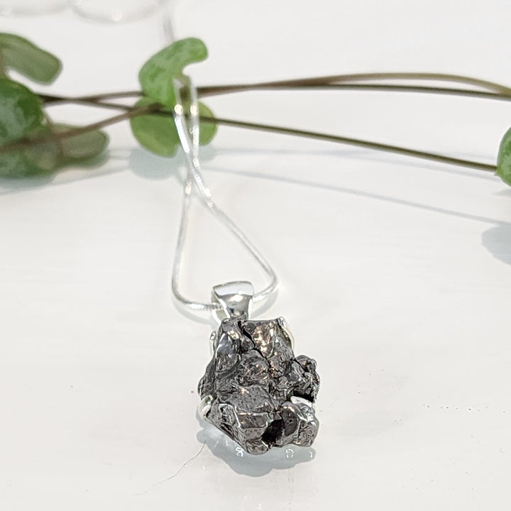 Meteorite Pendant set in 925 Sterling Silver.
Comes with 925 Sterling Silver 45cm Chain