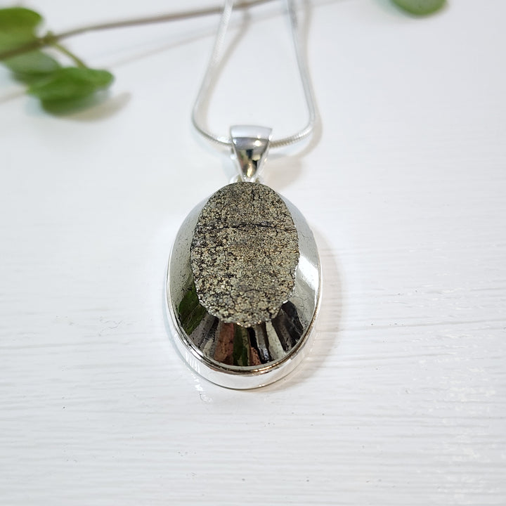 Druzy Pyrite Pendant set in 925 Sterling Silver.