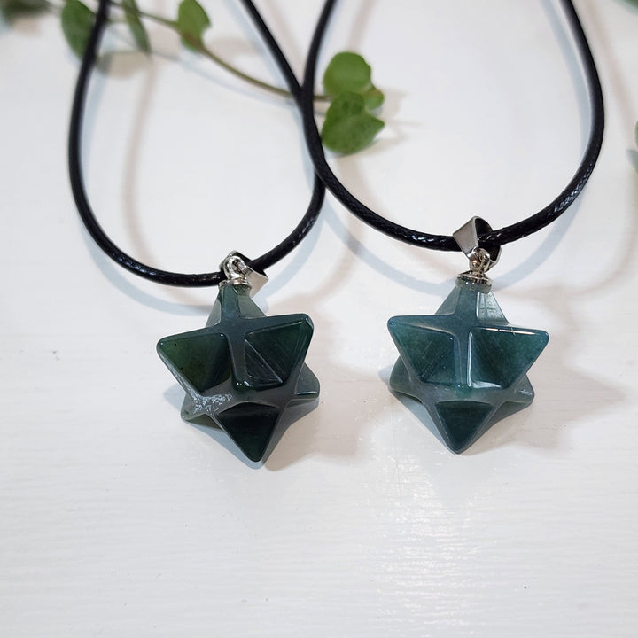 Indian Agate Merkabah Pendant comes with a black cord.