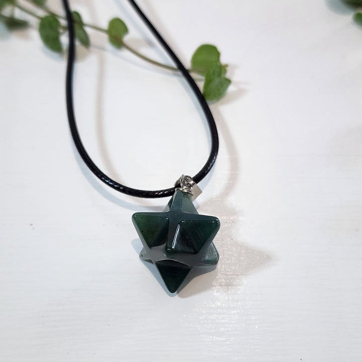 Indian Agate Merkabah Pendant comes with a black cord.