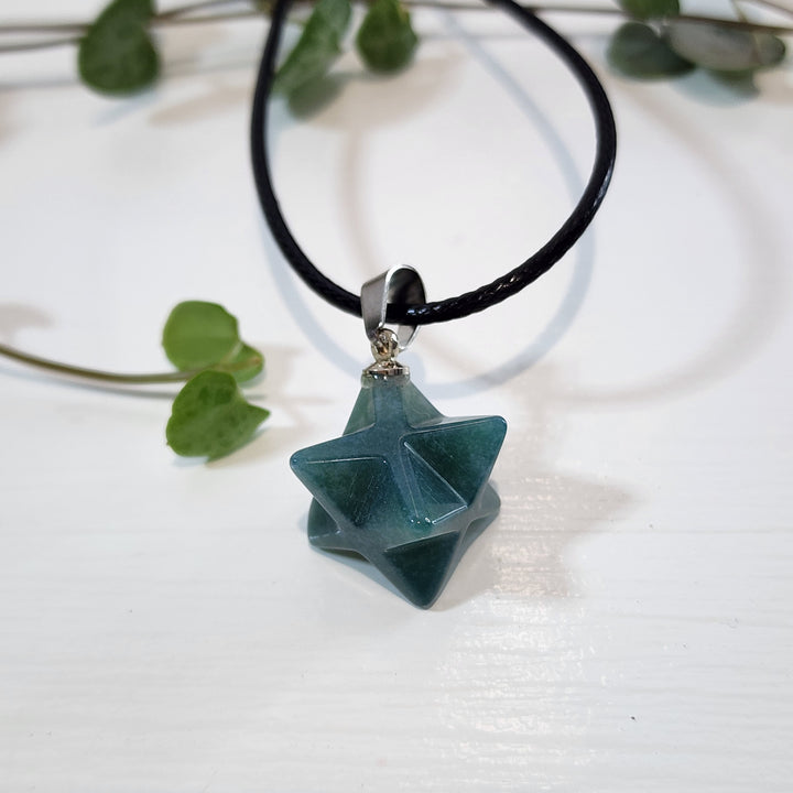 Indian Agate Merkabah Pendant comes with a black cord.