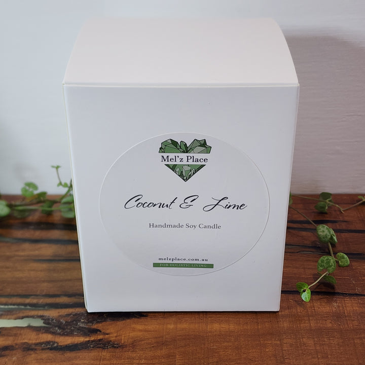 Mel'z Place Coconut and Lime Soy Candle in white box.