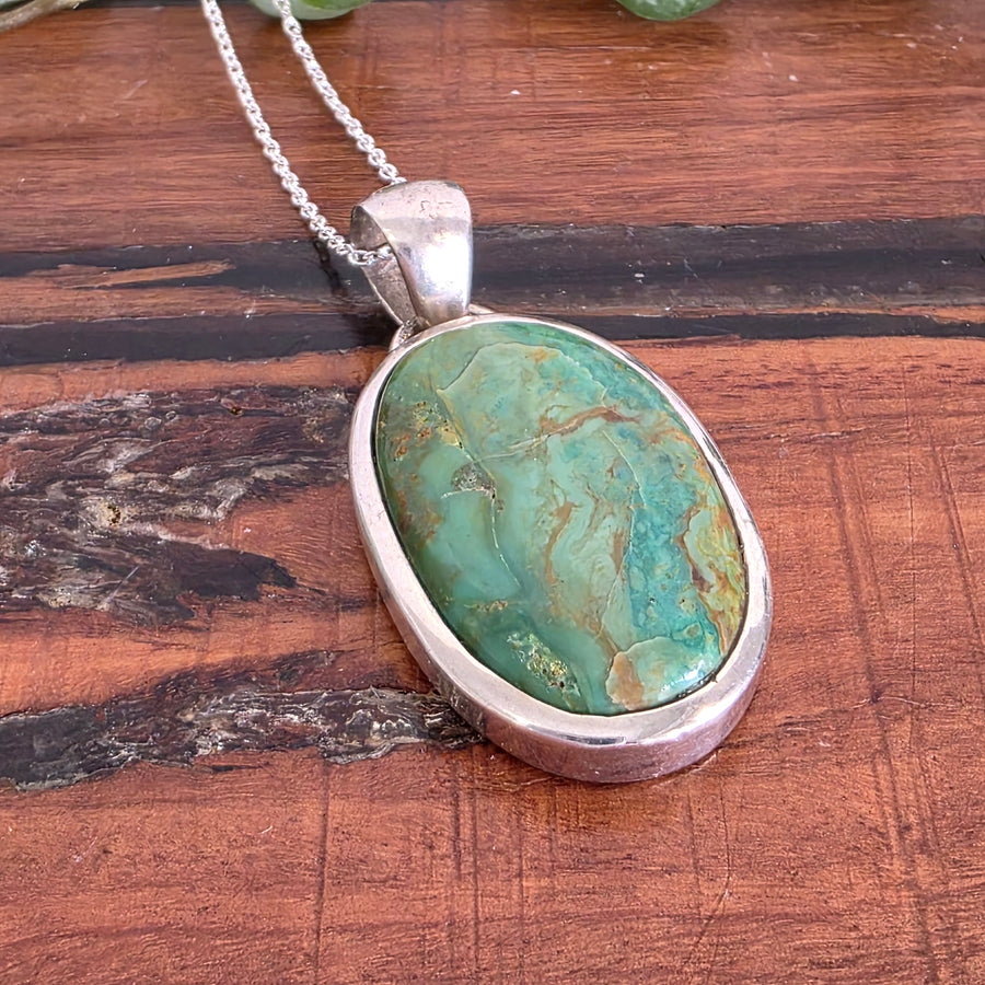 Green Copper Turquoise Necklace set in 925 Sterling Silver, comes with a 45cm Sterling Silver Chain.