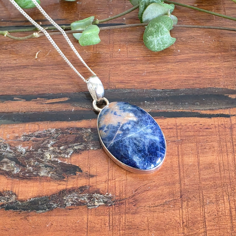 Sodalite Pendant set in 925 Sterling Silver and comes with a 45cm Sterling Silver Chain.