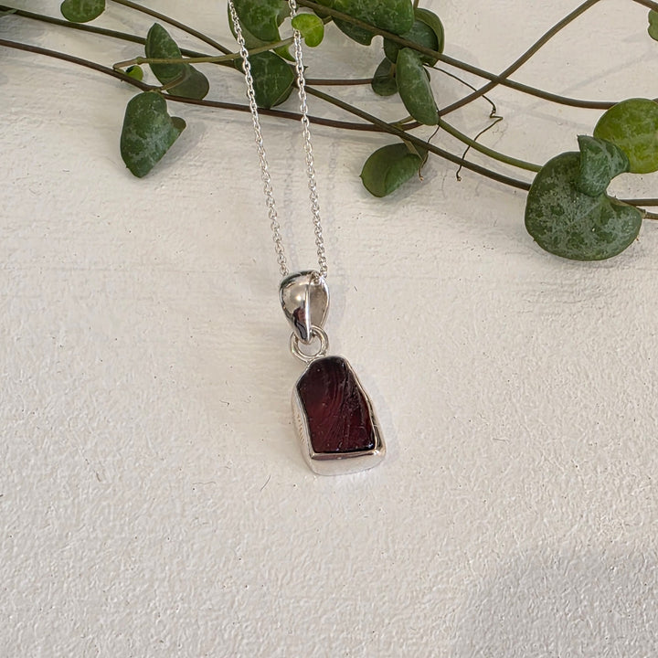 Rough Garnet Pendant set in 925 Sterling Silver,