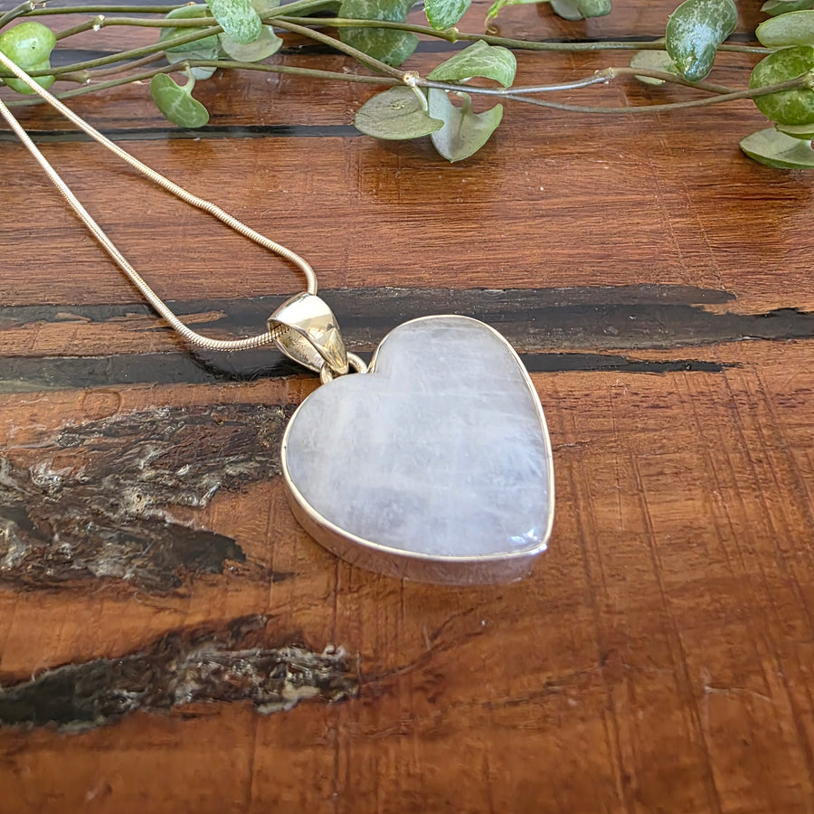 Rainbow Moonstone Heart Pendant.
Set in 925 Sterling Silver and comes with a 925 sterling silver chain.