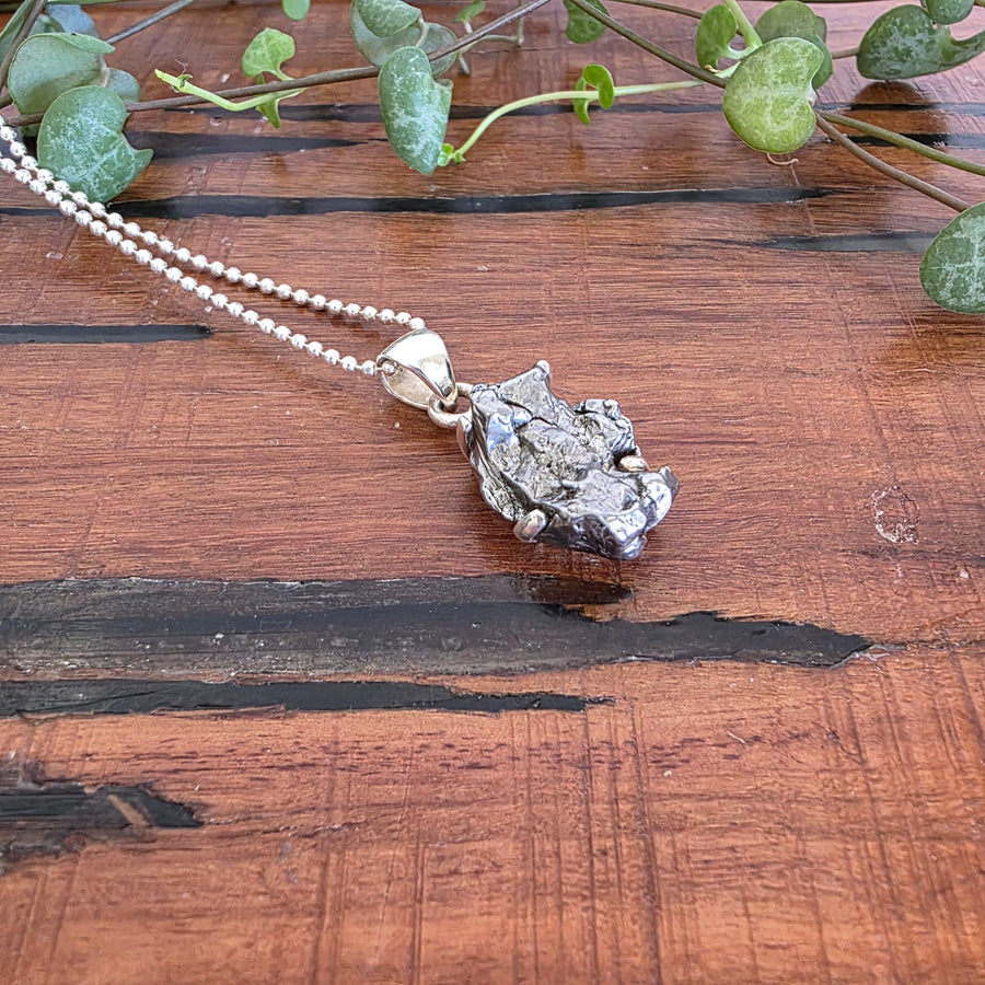 Meteorite Pendant set in 925 Sterling Silver.
Comes with 925 Sterling Silver 45cm Chain