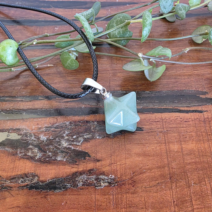 Green Aventurine Merkabah Pendant
Comes with a black cord necklace.