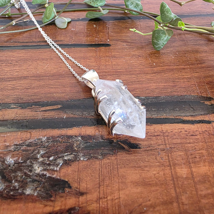 Clear Quartz Pendant Set in 925 Sterling Silver comes with 925 Sterling Silver Chain.