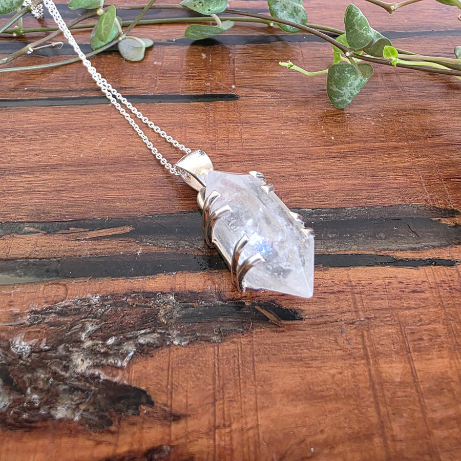 Clear Quartz Pendant Set in 925 Sterling Silver comes with 925 Sterling Silver Chain.