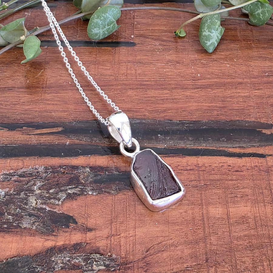 Rough Garnet Pendant set in 925 Sterling Silver,