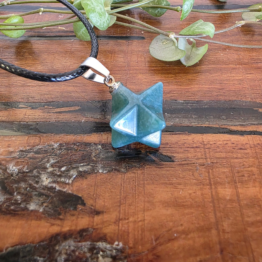 Indian Agate Merkabah Pendant comes with a black cord.