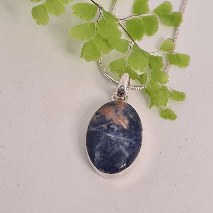 Sodalite Pendant set in 925 Sterling Silver and comes with a 45cm Sterling Silver Chain.