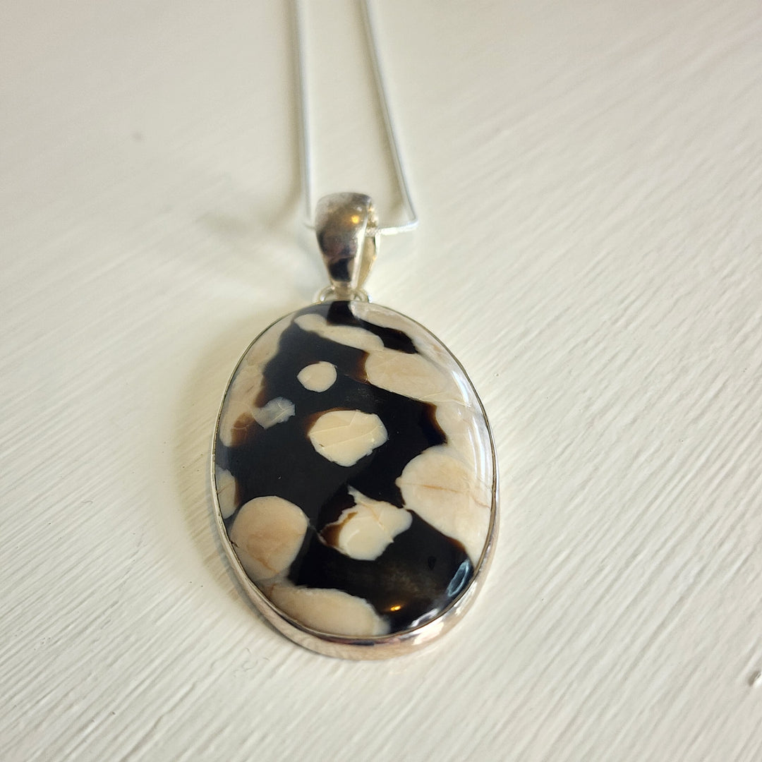 Peanut Wood Jasper Pendant in 925 Sterling Silver, comes with a 45cm 925 sterling silver chain.