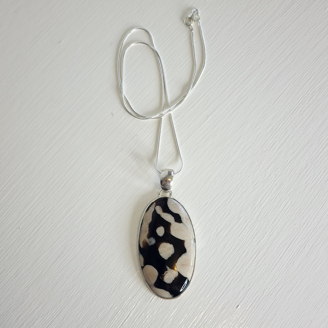 Peanut Wood Jasper Pendant in 925 Sterling Silver, comes with a 45cm 925 sterling silver chain.
