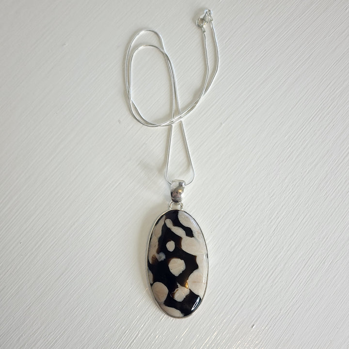 Peanut Wood Jasper Pendant in 925 Sterling Silver, comes with a 45cm 925 sterling silver chain.